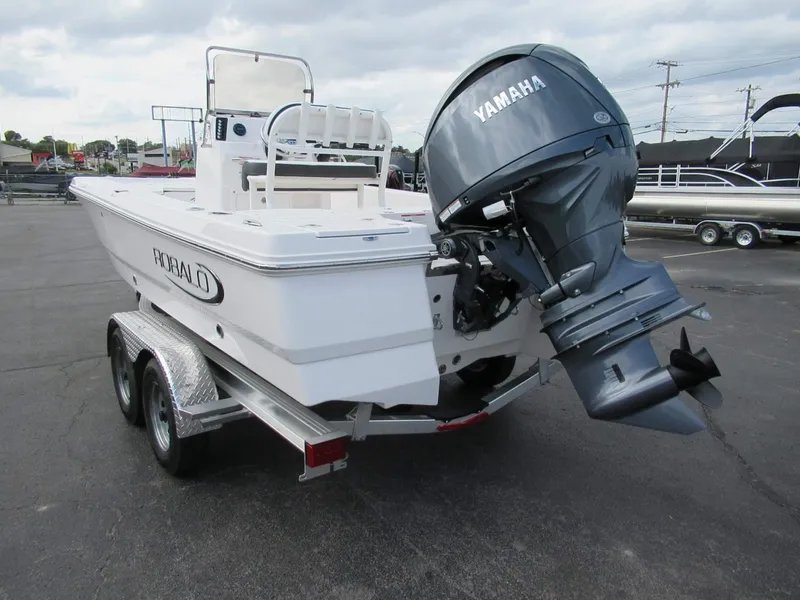 Slide: The Image of A 2027 Robalo 206 Pro boat on a trailer with a Yamaha outboard motor. - 7
