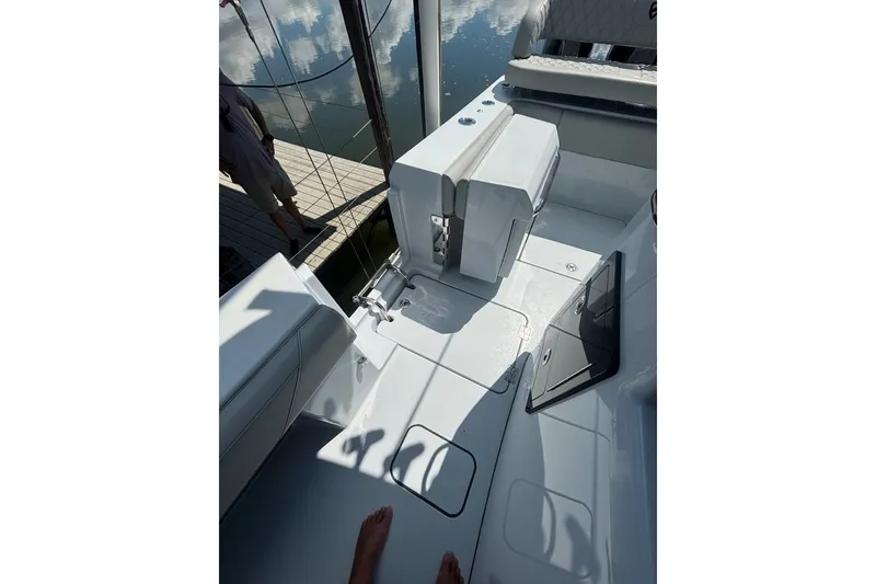 Slide: The Image of 2023 Barker Boatworks 40 HPC deck with seating and storage compartments. - 21