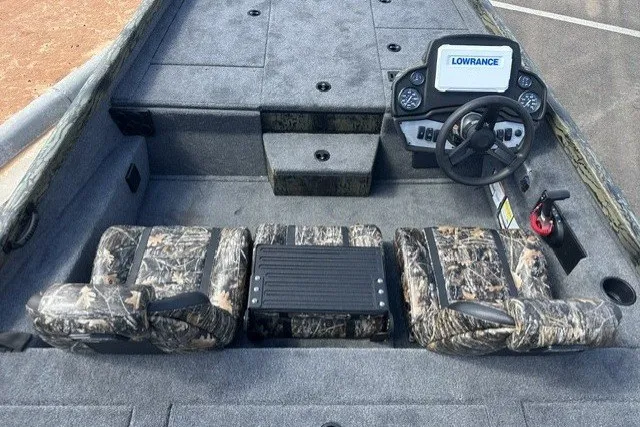 Slide: The Image of 2027 Ranger RT198P boat interior with camo seats and Lowrance navigation system. - 14