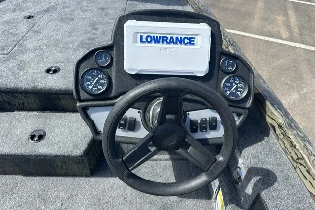 Slide: The Image of Steering console of 2027 Ranger RT198P boat with Lowrance display and gauges. - 15