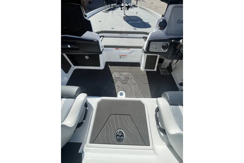 Slide: The Image of 2027 Nitro Z21 XL Pro boat interior with modern dashboard and seating. - 8