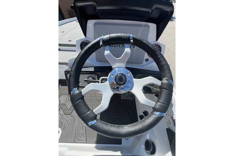 Slide: The Image of Steering wheel of 2027 Nitro Z21 XL Pro boat, featuring sleek design and modern controls. - 9