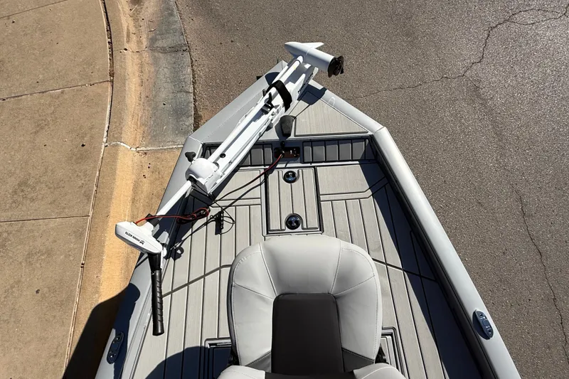 Slide: The Image of 2027 Tracker Bass Tracker 175 CC boat deck with trolling motor and seating. - 13