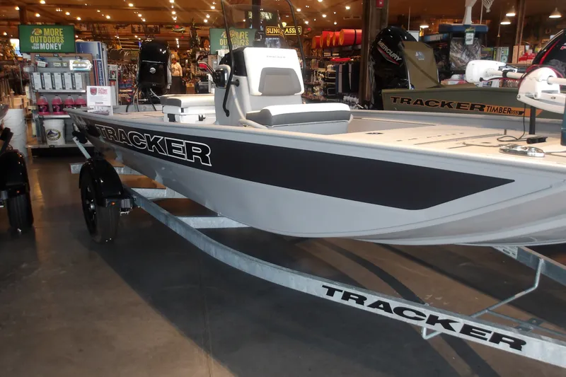 The Image of 2027 Tracker Bass Tracker Classic CC boat displayed in a showroom. - 0