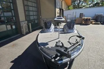 Slide: The Image of 2027 Nitro Z17 boat parked outdoors, showcasing sleek design and modern features. - 6