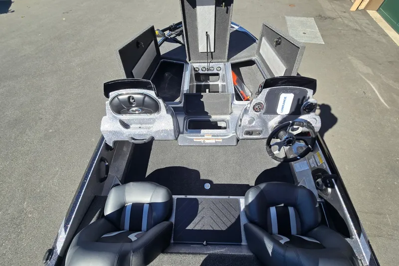 Slide: The Image of Interior view of a 2027 Nitro Z17 boat with open storage compartments. - 8