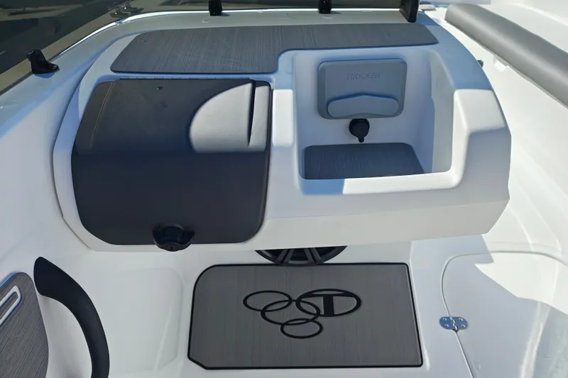 Slide: The Image of Interior of 2027 Tahoe T21 boat featuring storage compartments and sleek design elements. - 21