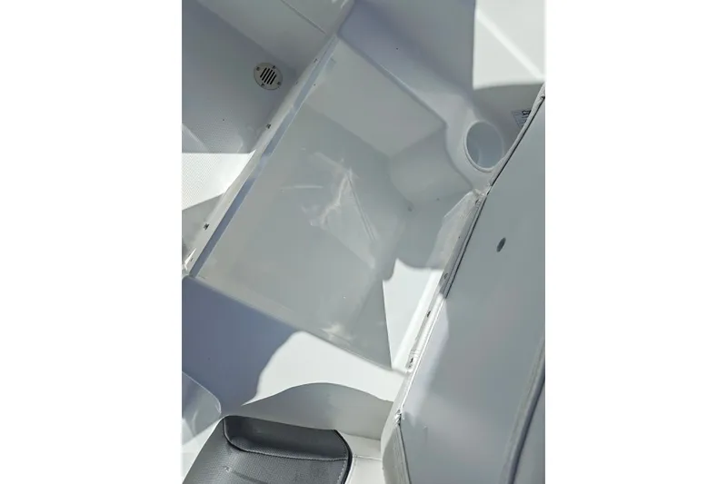 Slide: The Image of Interior view of 2027 Tahoe T21 boat, featuring sleek white surfaces and seating. - 43