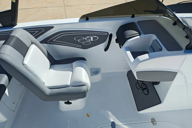 Slide: The Image of Interior of 2027 Tahoe T21 boat with modern seating and dashboard design. - 23