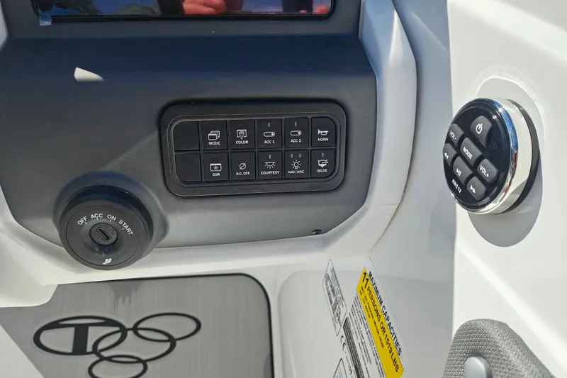 Slide: The Image of Control panel of a 2027 Tahoe T21 boat with various function buttons. - 15