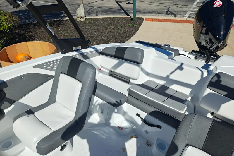 Slide: The Image of Interior of a 2027 Tahoe T21 boat with seating and motor. - 39