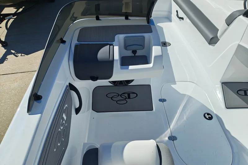 Slide: The Image of Interior view of 2027 Tahoe T21 boat, featuring seating and storage compartments. - 20