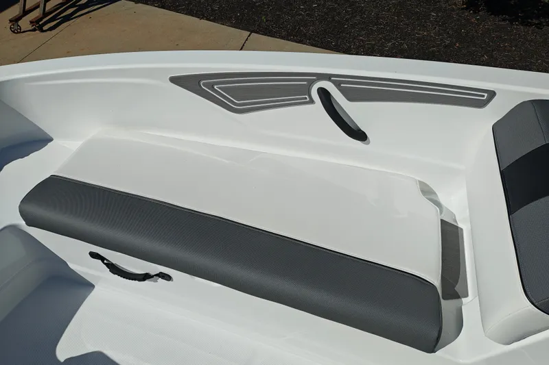 Slide: The Image of Interior seating of 2027 Tahoe T21 boat, featuring sleek white and gray design. - 27