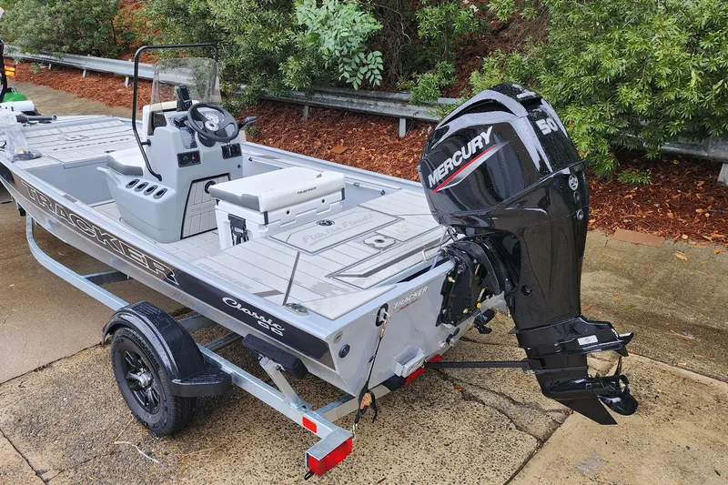 Slide: The Image of 2027 Tracker Bass Tracker Classic CC boat with Mercury outboard motor on trailer. - 60