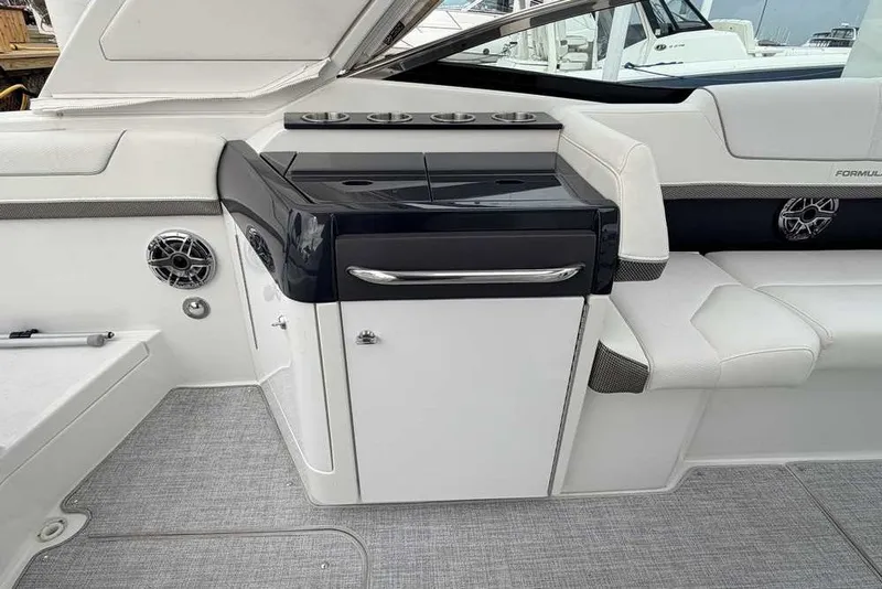 Slide: The Image of 2023 Formula 310 Bowrider I/O interior with sleek seating and modern amenities. - 9