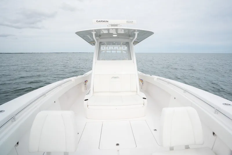 Slide: The Image of 2020 Invincible 39 Open Fisherman boat on calm ocean waters. - 18