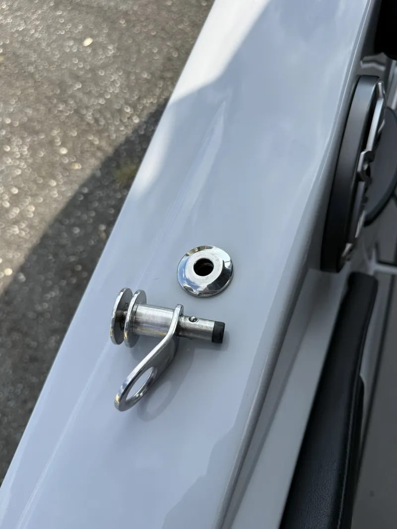 Slide: The Image of Close-up of a metal pin and bracket on a boat. - 11