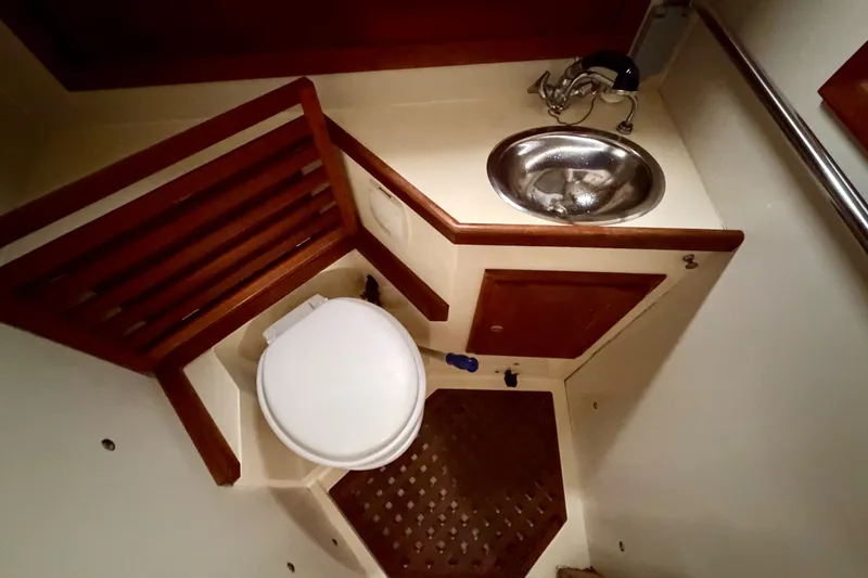Slide: The Image of Bathroom interior of 1997 Pacific Seacraft Crealock 37 yacht with sink and toilet. - 61