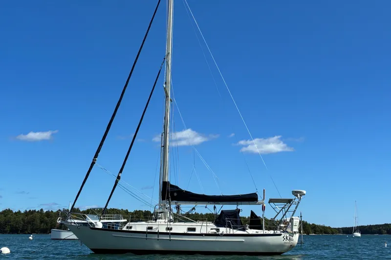 The Image of Sailboat Pacific Seacraft Crealock 37, 1997 model, anchored on a sunny day. - 0