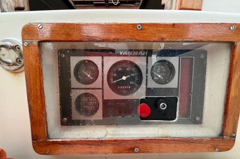 Slide: The Image of Yanmar engine control panel on 1997 Pacific Seacraft Crealock 37 sailboat. - 82