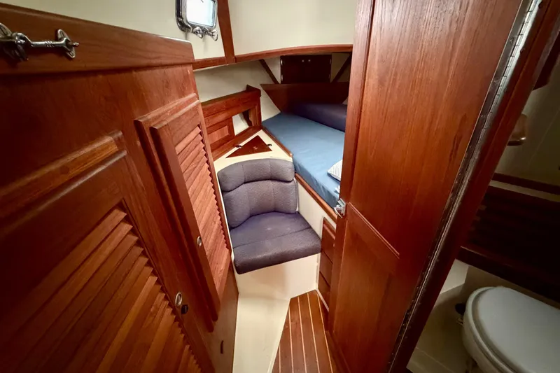 Slide: The Image of Interior of 1997 Pacific Seacraft Crealock 37 sailboat with wooden finishes and cozy cabin. - 66