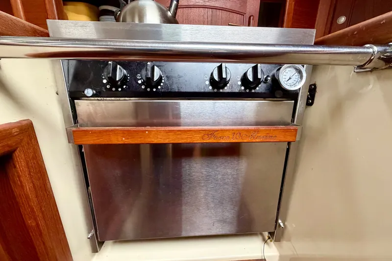 Slide: The Image of Stainless steel oven in 1997 Pacific Seacraft Crealock 37 yacht galley. - 22