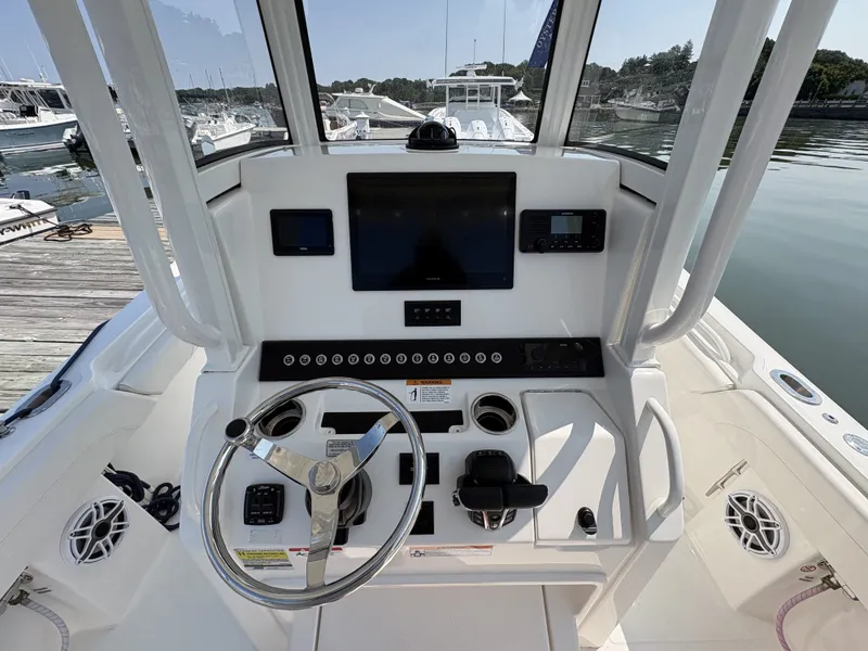 Slide: The Image of The cockpit of a 2025 Regulator 25 with a modern helm and electronics. - 31