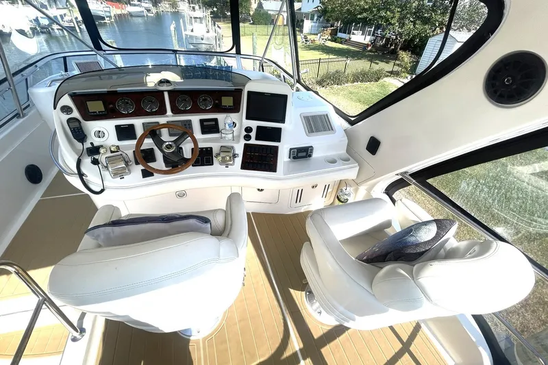Slide: The Image of HELM OVERVIEW WITH DUAL CAPTAINS CHAIRS WITH ARM RESTS & FLIP-UP BOLSTERS - 31