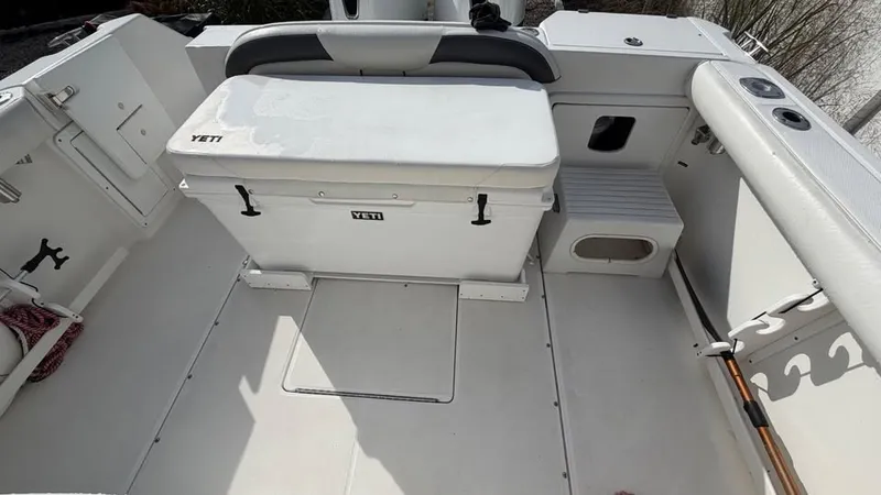 Slide: The Image of The image shows the cockpit of a 2007 Everglades 290 CC boat with a Yeti cooler. - 5