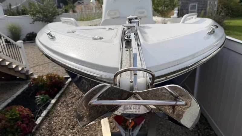 Slide: The Image of The 2007 Everglades 290 CC displays its bow anchor in a garden area. - 13