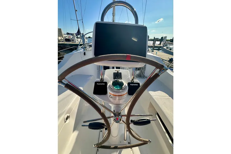 Slide: The Image of Steering wheel and navigation equipment on 2007 Hunter 41 Deck Salon sailboat. - 39