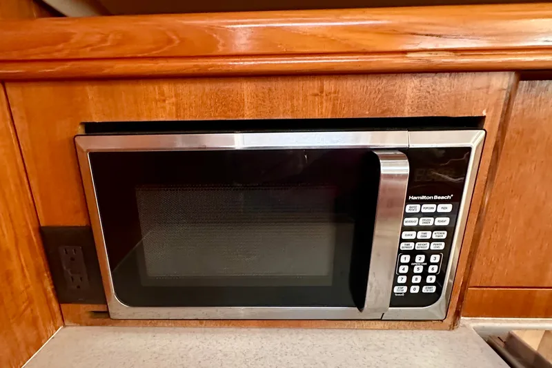 Slide: The Image of Built-in microwave in 2007 Hunter 41 Deck Salon yacht kitchen. - 23