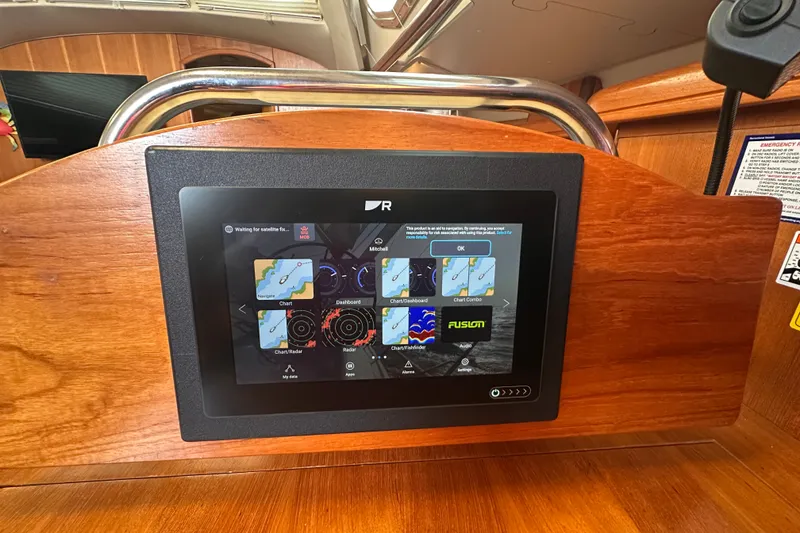 Slide: The Image of Navigation display on 2007 Hunter 41 Deck Salon yacht, featuring chart and radar interface. - 28