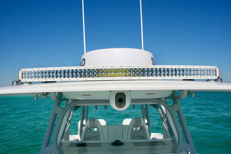 Slide: The Image of 2024 Freeman 38 boat with LED light bar on turquoise water background. - 33