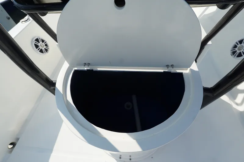 Slide: The Image of Open storage compartment on 2021 Cortez 31 Super Panga boat deck. - 12
