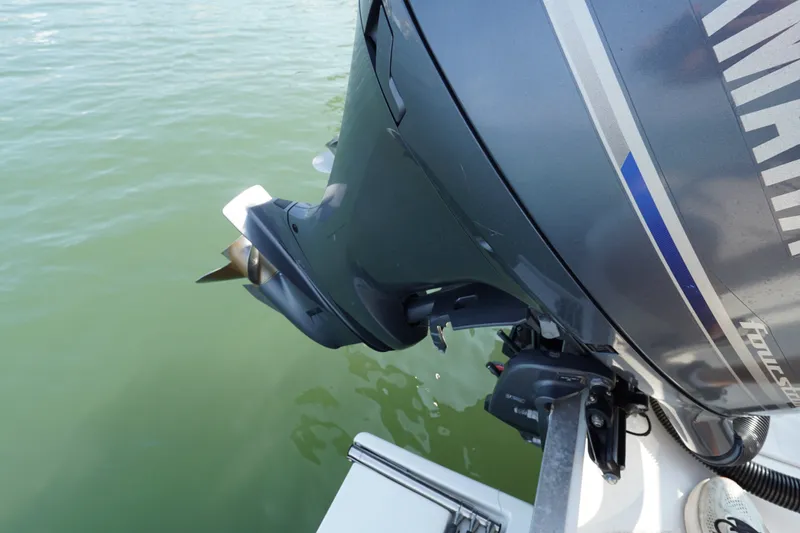 Slide: The Image of Outboard motor on a 2021 Cortez 31 Super Panga boat in water. - 26