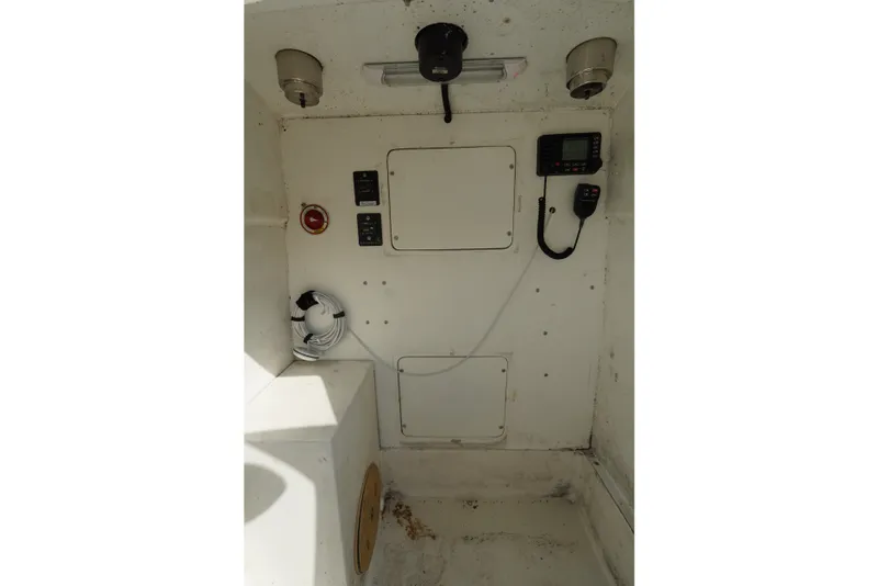 Slide: The Image of Interior of 2021 Cortez 31 Super Panga boat with control panel and equipment. - 16