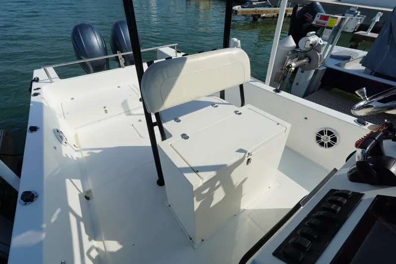 Slide: The Image of 2021 Cortez 31 Super Panga boat interior with seating and dual outboard motors. - 14