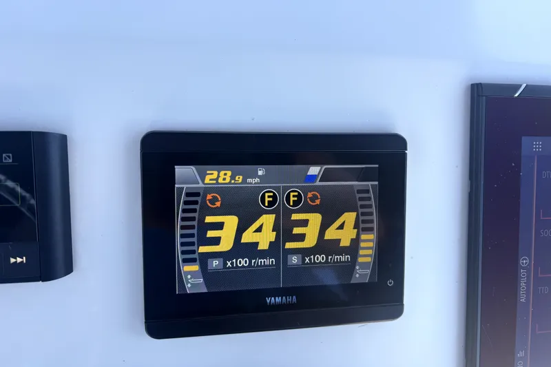 Slide: The Image of Yamaha display on 2021 Cortez 31 Super Panga showing speed and RPM. - 33