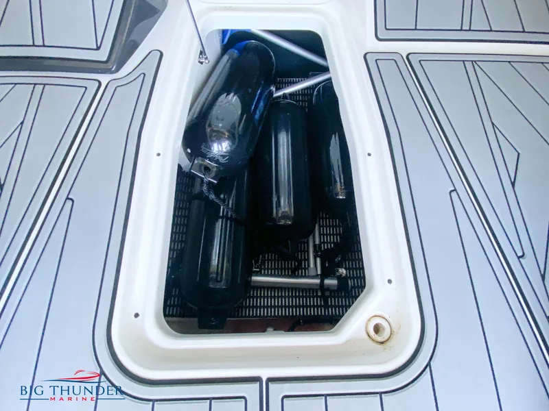 Slide: The Image of 2023 Monterey 298SS storage compartment with fenders, Big Thunder Marine logo. - 41