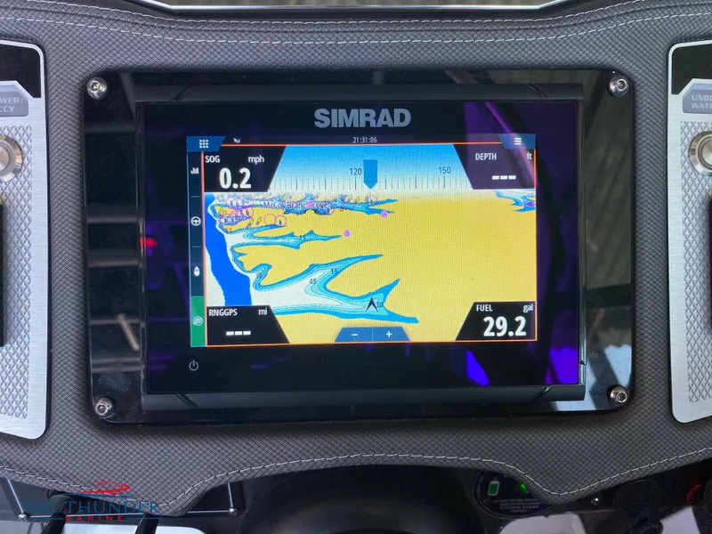 Slide: The Image of Simrad navigation display on 2023 Monterey 298SS boat showing speed, depth, and fuel levels. - 22