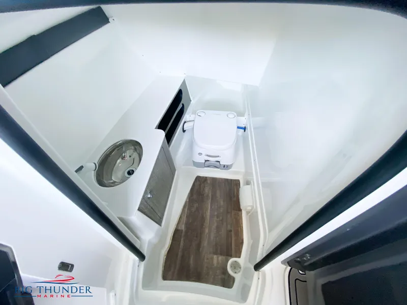 Slide: The Image of 2023 Monterey 298SS boat interior bathroom with sink and toilet - 29