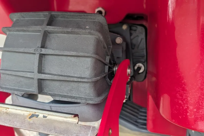 Slide: The Image of Close-up of 2019 Yamaha Boats 242 Limited S engine component in red casing. - 24