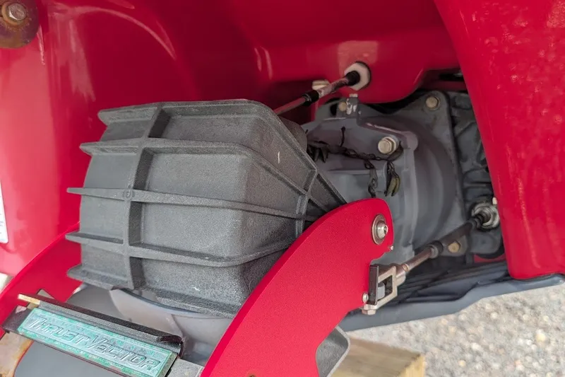 Slide: The Image of Close-up of 2019 Yamaha Boats 242 Limited S engine component in red casing. - 22
