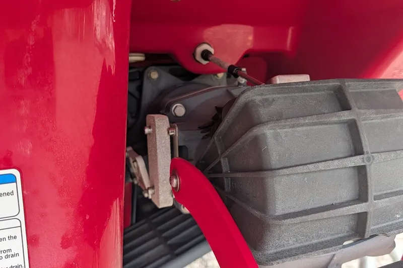 Slide: The Image of Close-up of 2019 Yamaha Boats 242 Limited S engine compartment, showcasing mechanical components. - 23