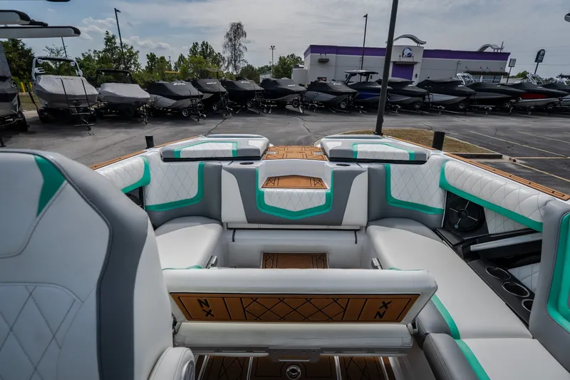 Slide: The Image of 2021 Tigé 21ZX boat interior with stylish seating and modern design. - 30
