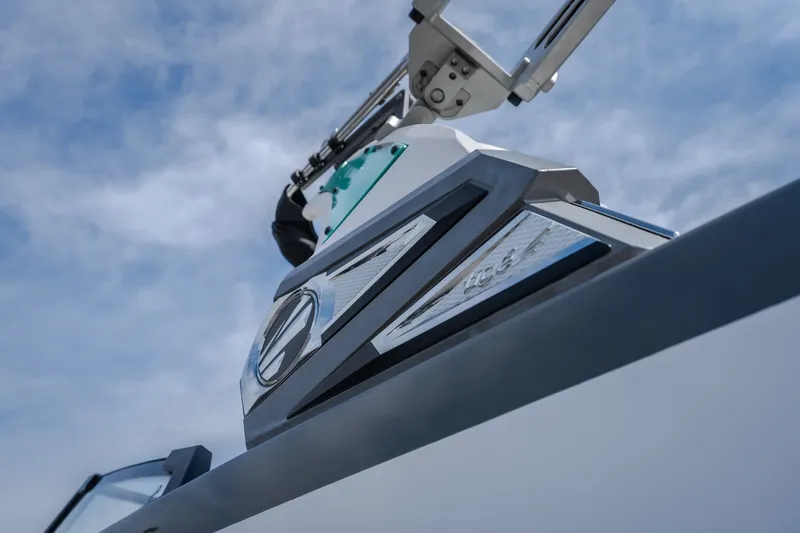 Slide: The Image of 2021 Tigé 21ZX boat tower against a blue sky, showcasing sleek design and branding. - 10