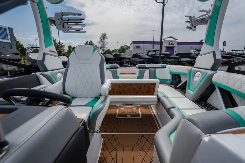 Slide: The Image of Interior of a 2021 Tigé 21ZX boat with luxurious seating and modern design. - 37