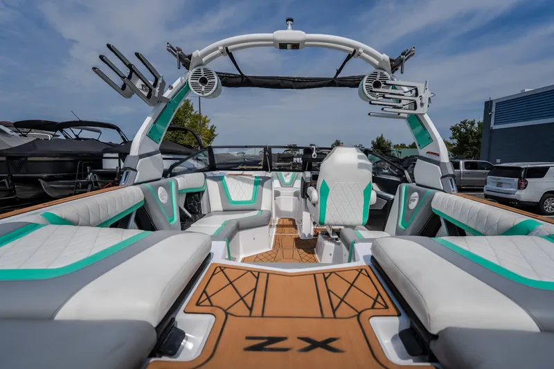 Slide: The Image of 2021 Tigé 21ZX boat interior with modern seating and sleek design. - 12