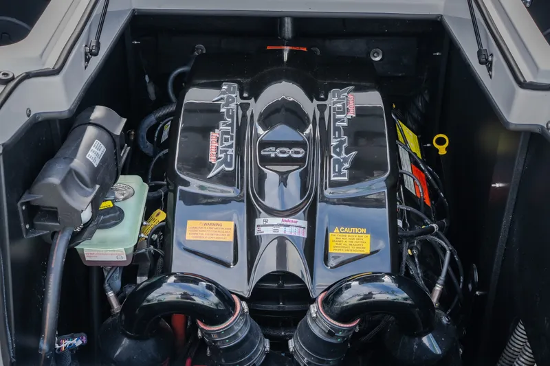 Slide: The Image of 2021 Tigé 21ZX boat engine, featuring a powerful Raptor 400 motor. - 26